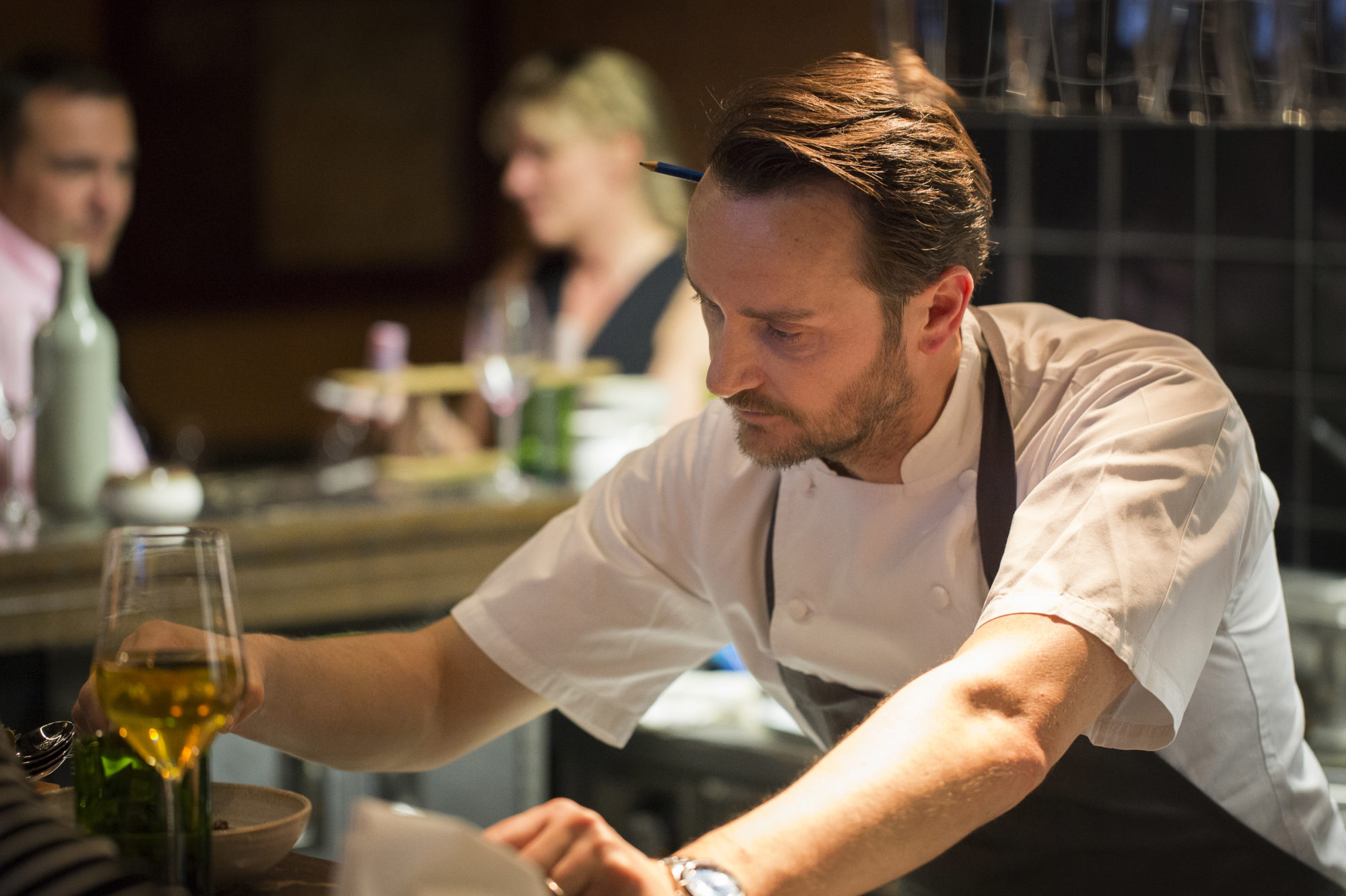 Jason Atherton plating up an exquisite fine dining experience