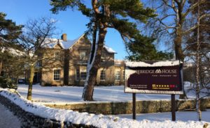 Yorebridge House wintery exterior - blue skies and freshly fallen snow